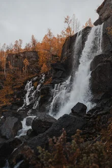 Photo art by Tobias Winkelmann: waterfalls in Norway illuminated by autumn light