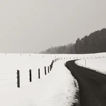 Photo art by Lena Weisbek: winter landscape with snow-covered road and calm atmosphere