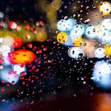 Photo art: colorful raindrops on a smooth surface in gentle hues.