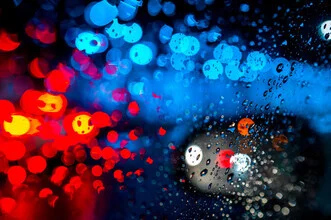 Photo art by J. Daniel Hunger: colorful raindrops on a transparent background.