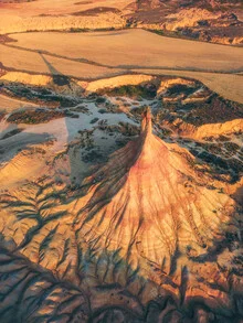Aerial view of Bardenas Reales in Spain, gentle shapes and warm colors in the morning light