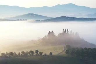 Photo art by Jean Claude Castor: picturesque Tuscany shrouded in mist over gentle hills