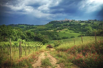 Photo art by Jean Claude Castor: Tuscany with dramatic clouds over vineyards