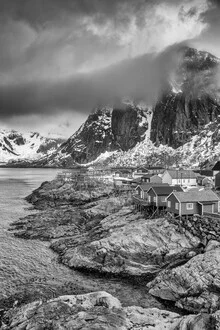 Photo art by Mikolaj Gospodarek: winter landscape with fishing hut and mountains in Lofoten