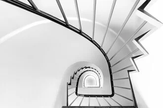 Decorative photo art featuring a round staircase in soft gray tones.
