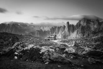 Black and white photo art by Christoph Schaarschmidt: mountain landscape with a hut
