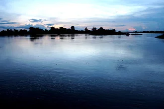 Fotokunst von Marisa Pettit: Sonnenuntergang über den 4000 Inseln in Laos