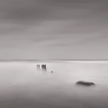 Fotokunst von Dennis Wehrmann: ruhige Wellen im sanften Licht der Ostsee