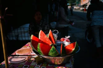 Photo art by Jim Delcid: market at Inle Lake in Myanmar with fresh watermelons.