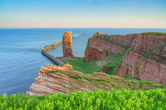 View of Lange Anna on Heligoland in the early morning light, calm coastal mood.