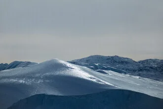 Iceberg in Greenland: calm, cold colors and a mysterious atmosphere