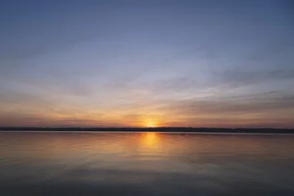 Beautiful sunset at the Baltic Sea shore in Glücksburg
