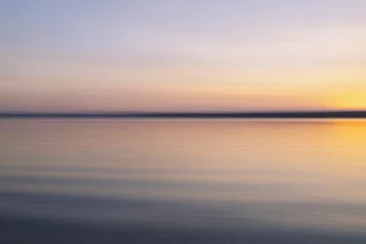 Blurred sunset colors over the Baltic Sea, soft mood with harmonious tones.
