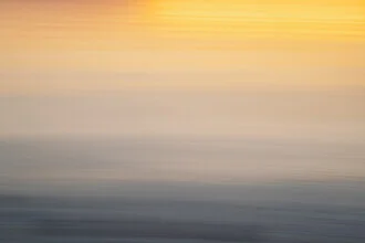 Sunset with blurred colors over the Baltic Sea