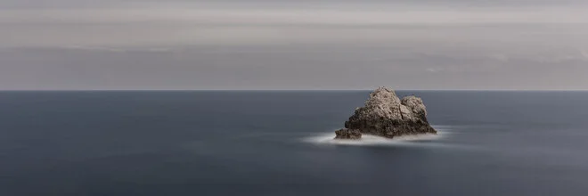 Photo art by Dennis Wehrmann: tranquil coastal landscape with rocks by the Mediterranean Sea
