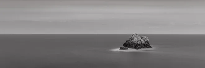 Photo art by Dennis Wehrmann: tranquil seascape featuring rocks in the Mediterranean Sea