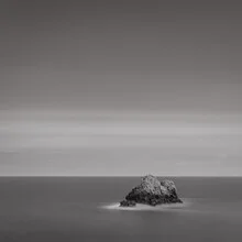 Photo art: peaceful scene with gentle waves and rocks by the Mediterranean Sea