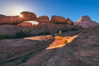 Photo art by Jean Claude Castor: Landscape with rocks and natural arch in Namibia