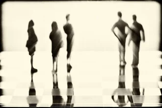 Photo art by Roswitha Schleicher-Schwarz: blurred figures on a chessboard