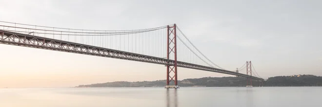 Photo art by Dennis Wehrmann: bridge over the Tejo at sunrise in Lisbon