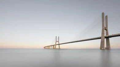 Photo art by Dennis Wehrmann: long exposure of Ponte Vasco da Gama at sunset