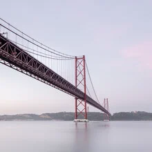 Photo art by Dennis Wehrmann: sunrise over the Ponte 25 de Abril in Lisbon