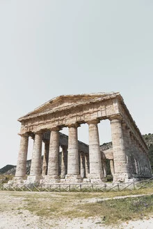 Photo art featuring the Segesta temple in Sicily, surrounded by gentle hills.