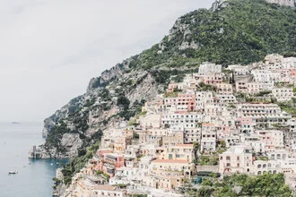 View on Positano: Gentle hills with colorful houses by the sea