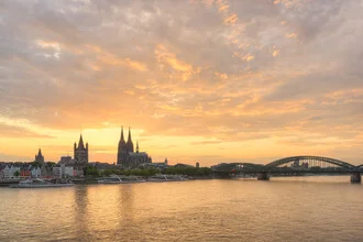 Photo art by Michael Valjak: Cologne skyline at sunset over the Rhine River