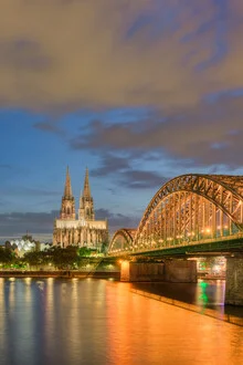 Photo art by Michael Valjak: Cologne Cathedral at twilight with warm lights.