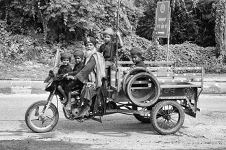Smiling people on the street in India, radiating joy and a sense of community.