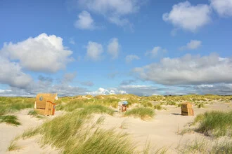 Photo art by Michael Valjak: beach chairs in the dunes of Amrum under sunlight.