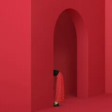 Photo art by Caterina Theoharidou: a woman in a red dress, hidden and contemplative