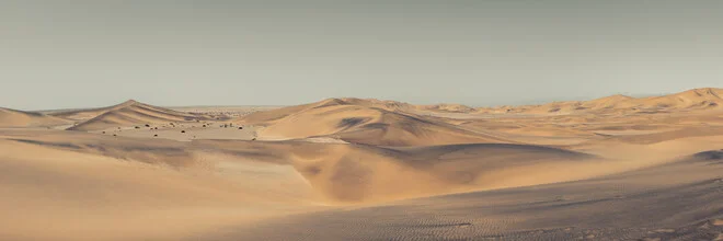 Photo art by Dennis Wehrmann: Panorama of the Namib Desert with gentle dunes and sky.