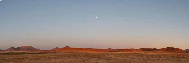 Photo art by Dennis Wehrmann: landscape with mountains and moon over Palmwag in Namibia