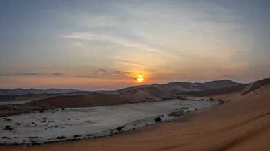 Photo art by Dennis Wehrmann: gentle sunrise over the dunes of Sossusvlei in Namibia