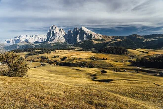 Photo art by Eva Stadler: Autumn landscape at Alpe di Siusi with gentle meadows and mountains.