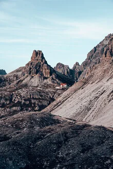 Beautiful photo art by Eva Stadler: mountain hut in the Dolomites under a clear sky.
