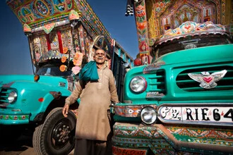 Photo art by Matthias Barth: Portrait of a cheerful truck painter in Pakistan