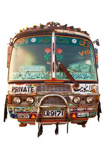 Colorful vehicle adorned with decorative elements reflecting Pakistani truck art.