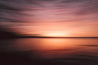Photo art by Nadja Jacke: sunset over the Baltic Sea in soft colors.