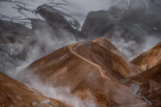 Steaming mountains in Kerlingarfjöll, Iceland, with gentle hills and a mystical sky.