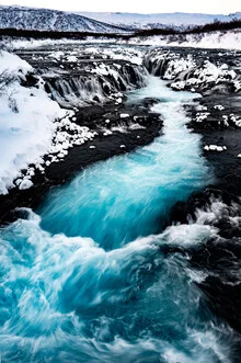 Photo art by J. Daniel Hunger: winter landscape featuring a waterfall in Iceland