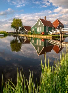 Spring in Holland: serene scene with a bridge and reflection in the water