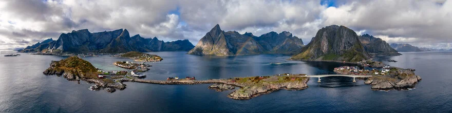 Aerial view of Lofoten with mountains, islands, and coastline in soft colors