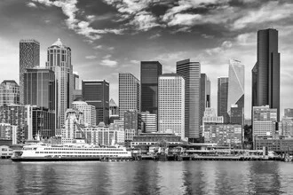 Black and white photo of Downtown Seattle showcasing sleek skyscrapers.