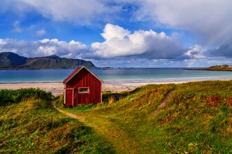 Photo art by Achim Thomae: Beach house on the Lofoten coast under a rainbow