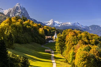 Beautiful autumn landscape in the Bavarian Alps with colorful trees.