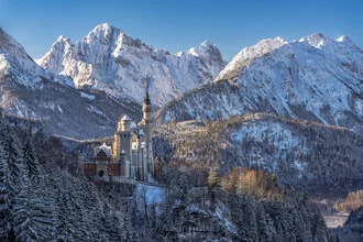 Photo art by Achim Thomae: Neuschwanstein Castle in snowy mountains at sunrise