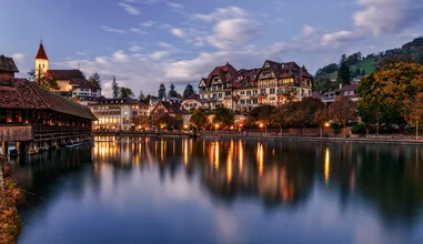 Photo art by Achim Thomae: Blue Hour at Lake Thun with city and reflections